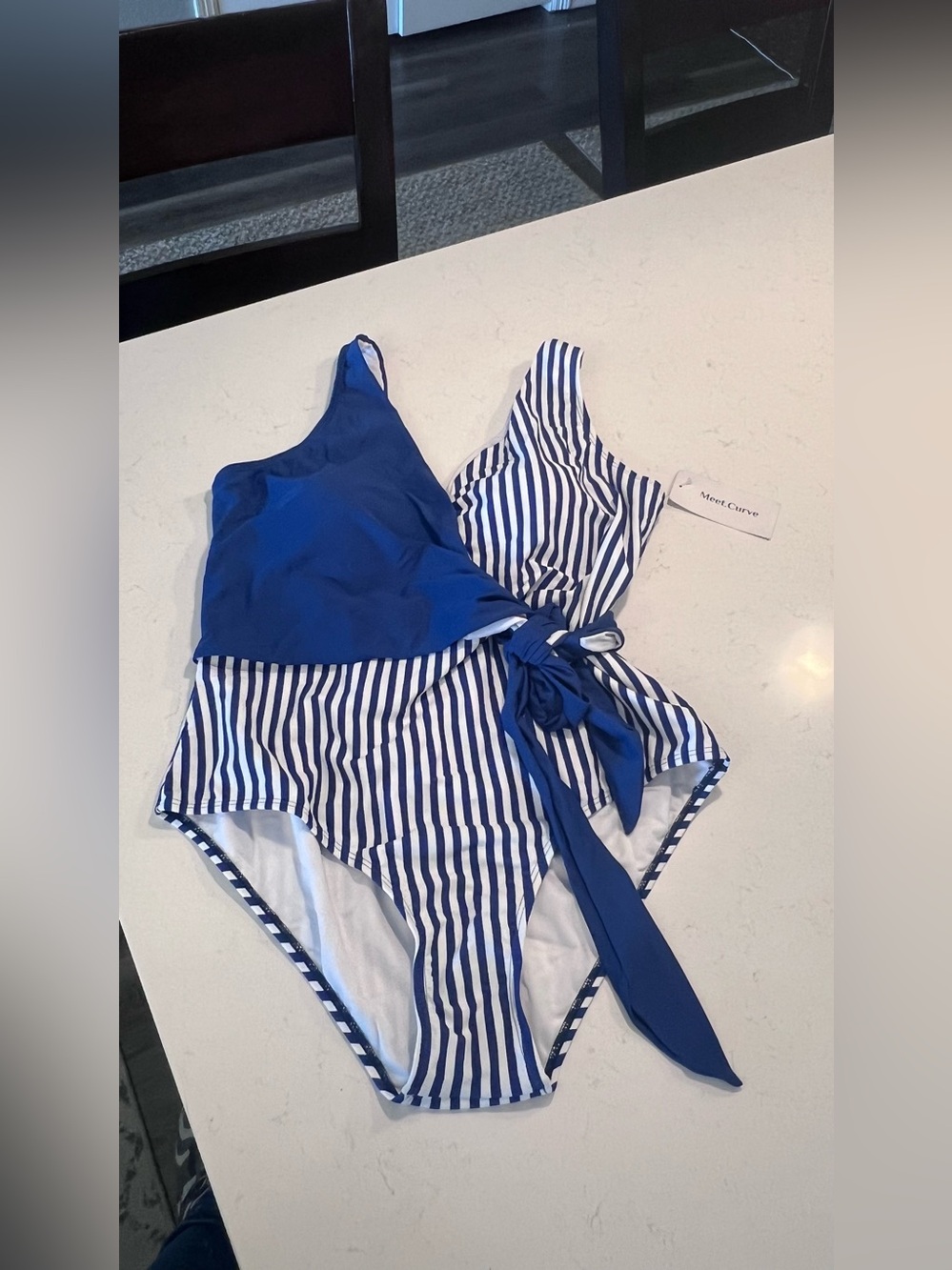 Meet.Curve Blue V-Neck Striped One Piece
Swimsuit size XL